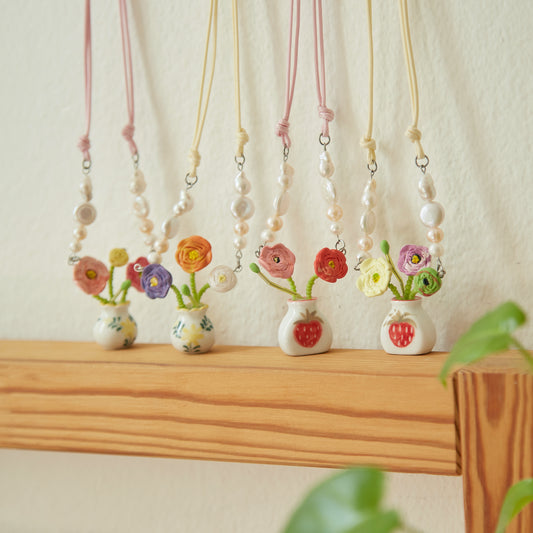 Tiny Poppy Flowers in vase necklaces